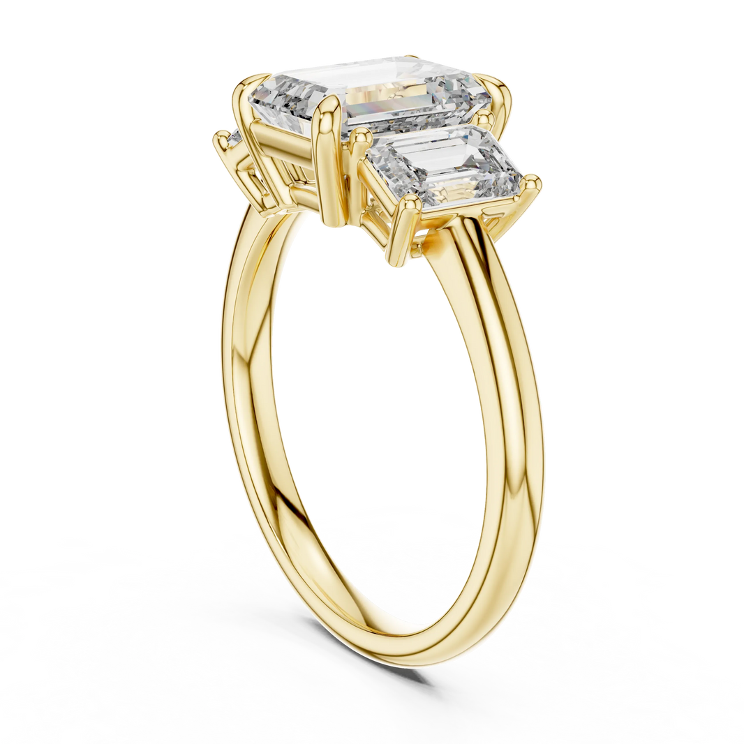 Emerald Cut Three Stone Moissanite Ring in yellow 925 sterling silver, view 1