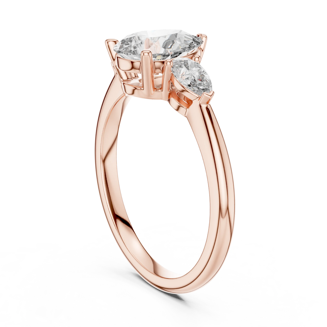 Pear Three Stone Moissanite Engagement Ring in rose 925 sterling silver, view 1