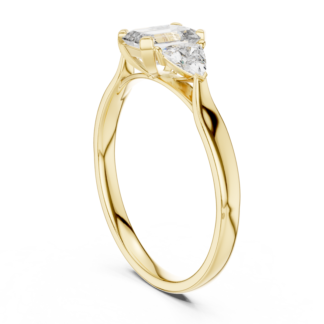 Emerald Cut and Trillion Three Stone Moissanite Ring in yellow 925 sterling silver, view 1
