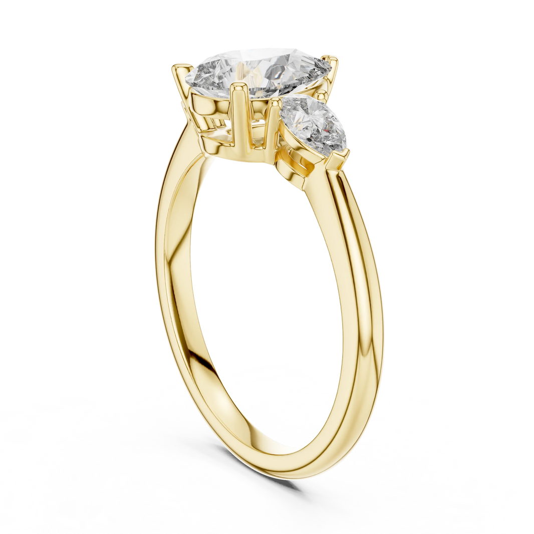 Pear Three Stone Moissanite Engagement Ring in yellow 925 sterling silver, view 1