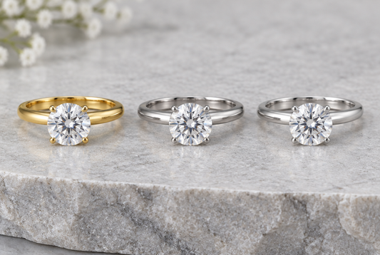 Moissanite solitaire rings in three different metals