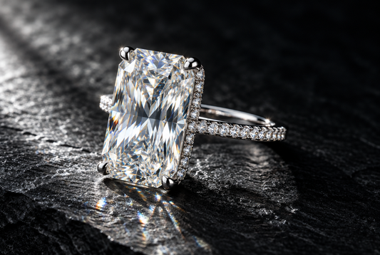 Radiant cut moissanite ring on dark slate