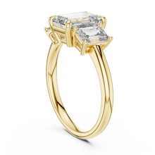 Emerald Cut Three Stone Moissanite Ring in yellow 925 sterling silver, view 1