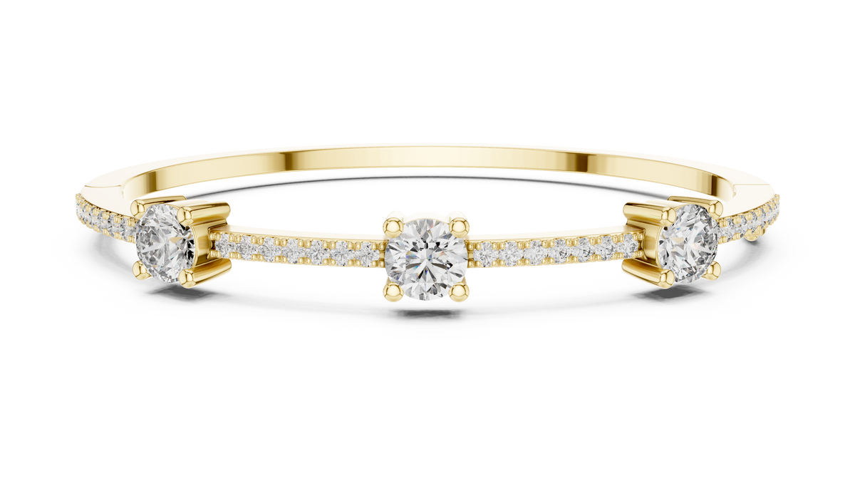 Three Stone Moissanite Bangle in yellow 925 sterling silver, view 1