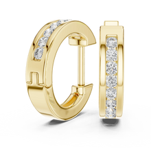 Moissanite channel set huggie earrings in yellow 925 sterling silver, view 1