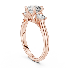Round Three Stone Moissanite Engagement Ring in rose 925 sterling silver, view 1