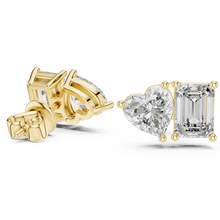 Heart and emerald moissanite toi et moi stud earrings in yellow 925 sterling silver, view 1