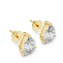 Pear moissanite stud earrings in yellow 925 sterling silver, view 2
