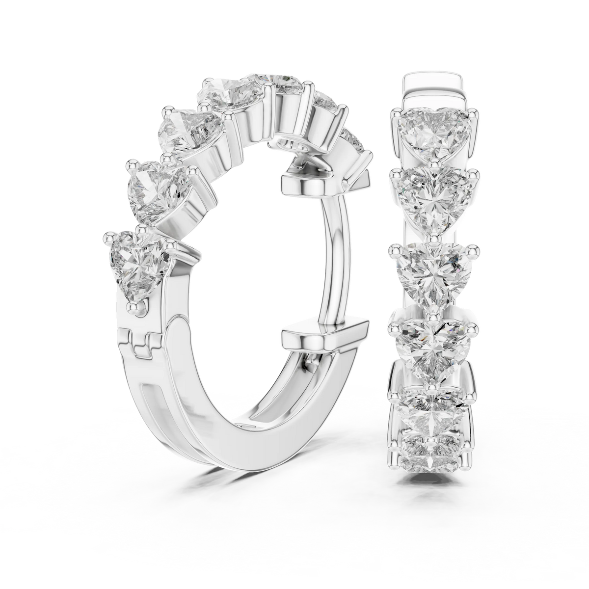Heart moissanite huggie hoop earrings in white 925 sterling silver, view 1