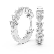 Heart moissanite huggie hoop earrings in white 925 sterling silver, view 1