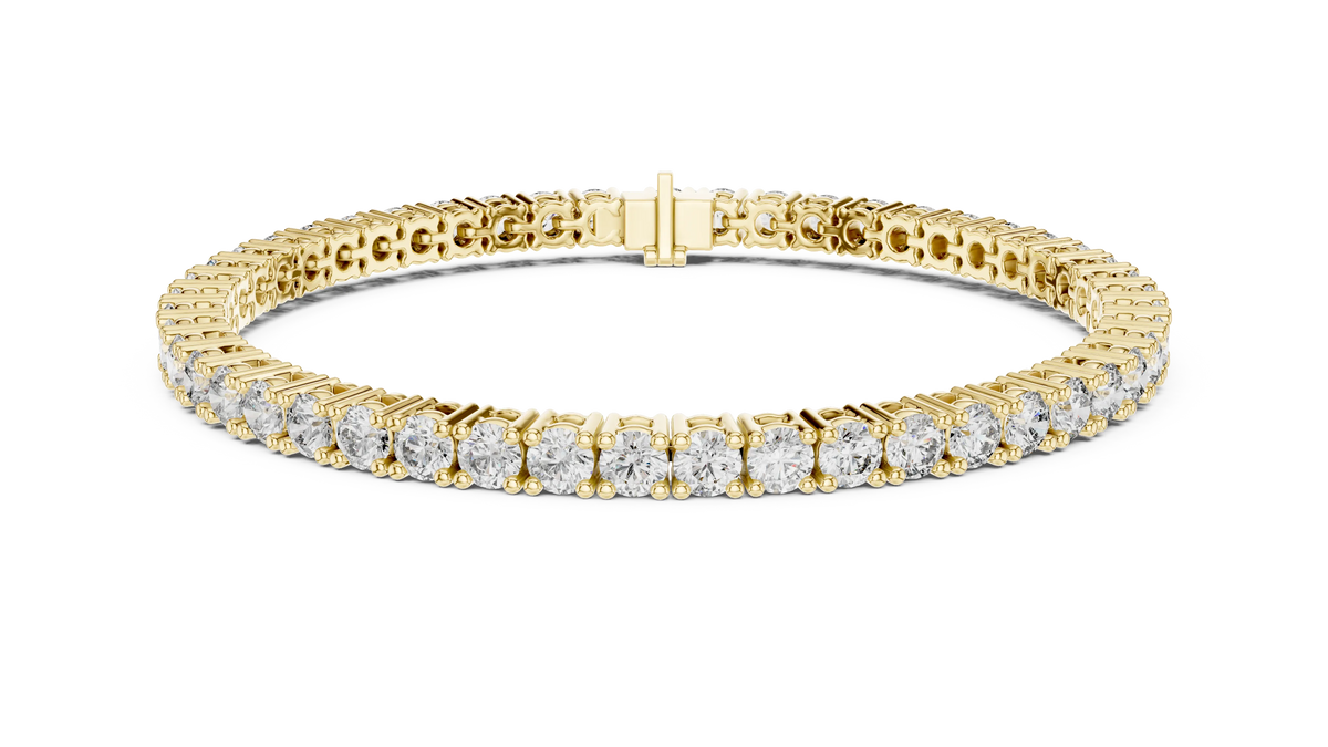Round Four Prong Moissanite Tennis Bracelet in yellow 925 sterling silver, view 1