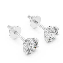 Round moissanite six-prong stud earrings in white 925 sterling silver, view 2