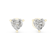 Heart moissanite stud earrings in yellow 925 sterling silver, three-prong basket, view 4