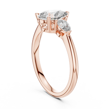 Pear Three Stone Moissanite Engagement Ring in rose 925 sterling silver, view 1