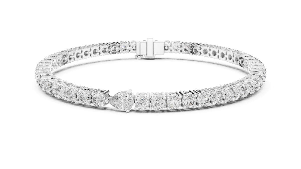 Pear Centre Round Moissanite Tennis Bracelet in white 925 sterling silver, view 1