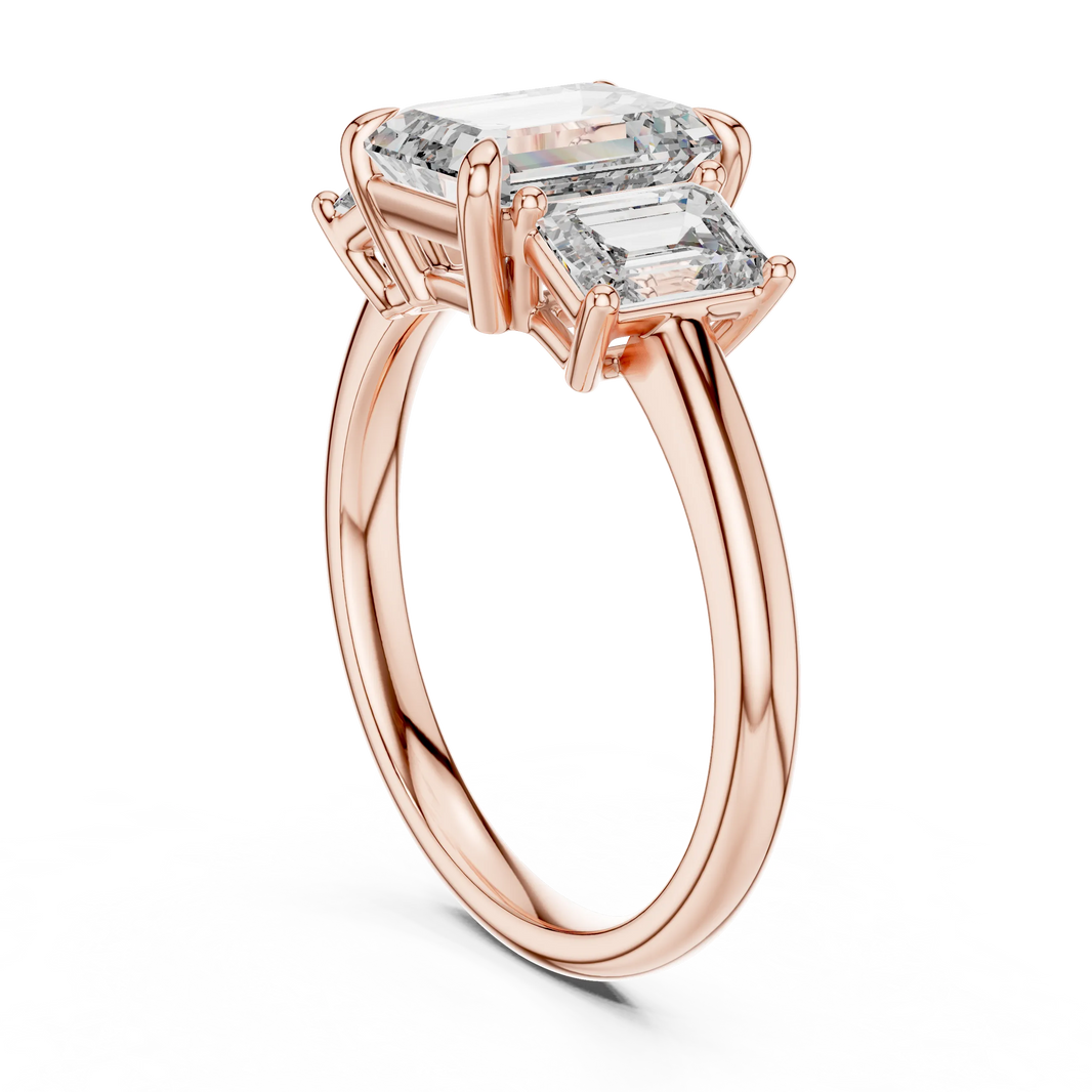 Emerald Cut Three Stone Moissanite Ring in rose 925 sterling silver, view 1