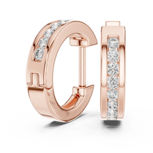 Moissanite channel set huggie earrings in rose 925 sterling silver, view 1