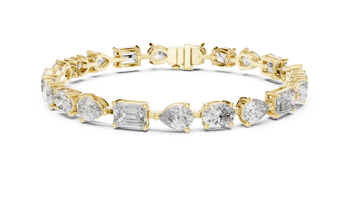 Oval Pear and Emerald Moissanite Tennis Bracelet in yellow 925 sterling silver, view 1