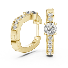 Moissanite solitaire pave huggie earrings in yellow 925 sterling silver, view 1