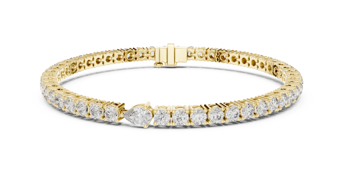 Pear Centre Round Moissanite Tennis Bracelet in yellow 925 sterling silver, view 1