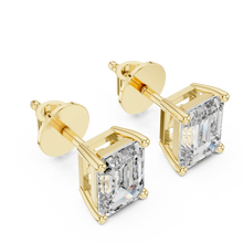 Emerald moissanite stud earrings in yellow 925 sterling silver, four-prong basket, view 2
