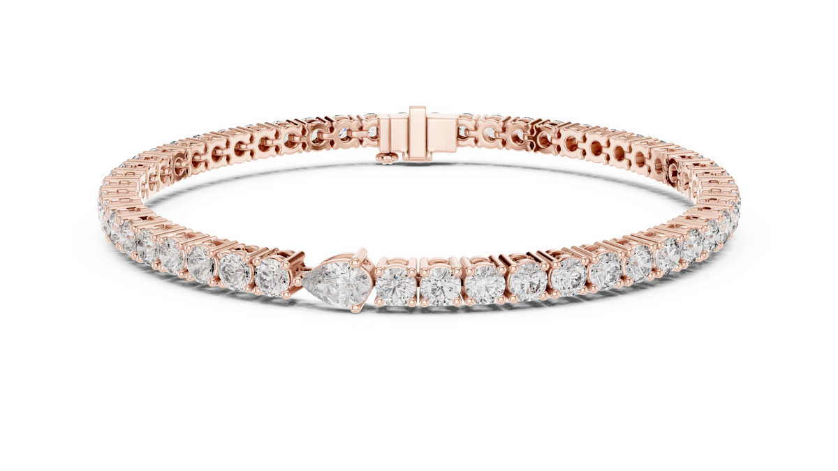 Pear Centre Round Moissanite Tennis Bracelet in rose 925 sterling silver, view 1