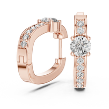 Moissanite solitaire pave huggie earrings in rose 925 sterling silver, view 1