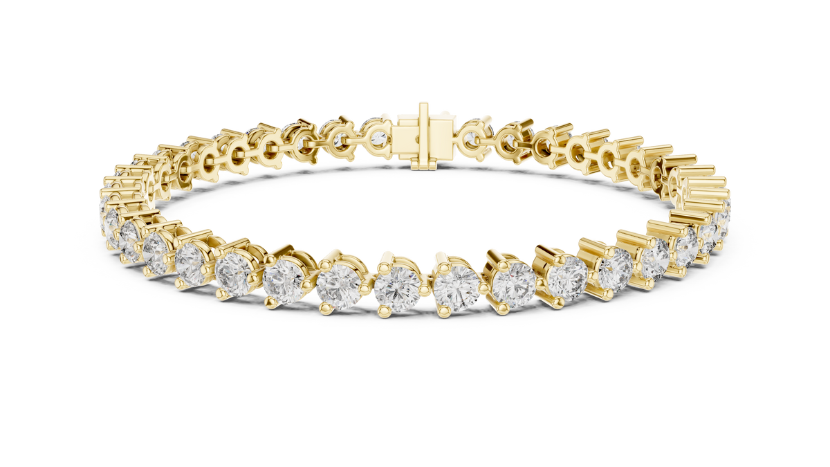 Three Prong Round Moissanite Tennis Bracelet in yellow 925 sterling silver, view 1
