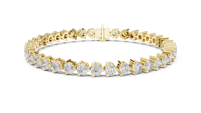 Three Prong Round Moissanite Tennis Bracelet in yellow 925 sterling silver, view 1