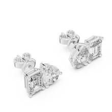 Pear and emerald moissanite toi et moi stud earrings in white 925 sterling silver, view 2