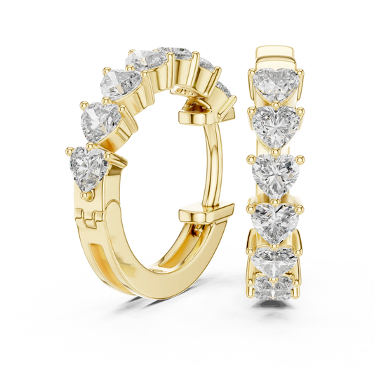 Heart moissanite huggie hoop earrings in yellow 925 sterling silver, view 1