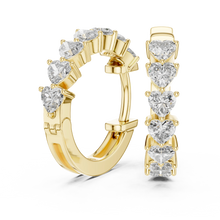 Heart moissanite huggie hoop earrings in yellow 925 sterling silver, view 1