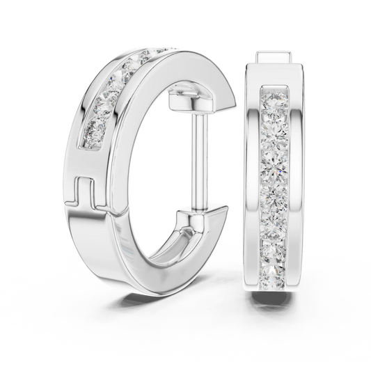Moissanite channel set huggie earrings in white 925 sterling silver, view 1