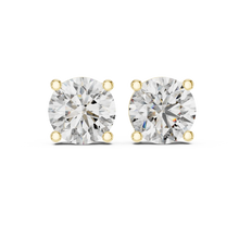 Round moissanite stud earrings in 925 sterling silver with yellow gold plating, view 4