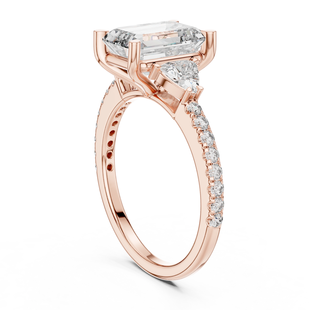 Emerald Cut Trillion Three Stone Pavé Moissanite Ring in rose 925 sterling silver, view 1
