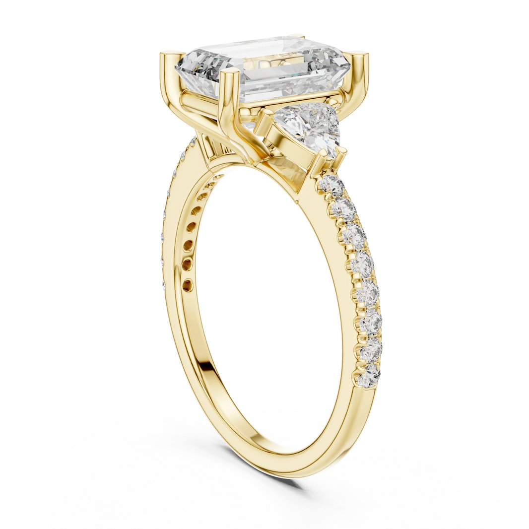Emerald Cut Trillion Three Stone Pavé Moissanite Ring in yellow 925 sterling silver, view 1