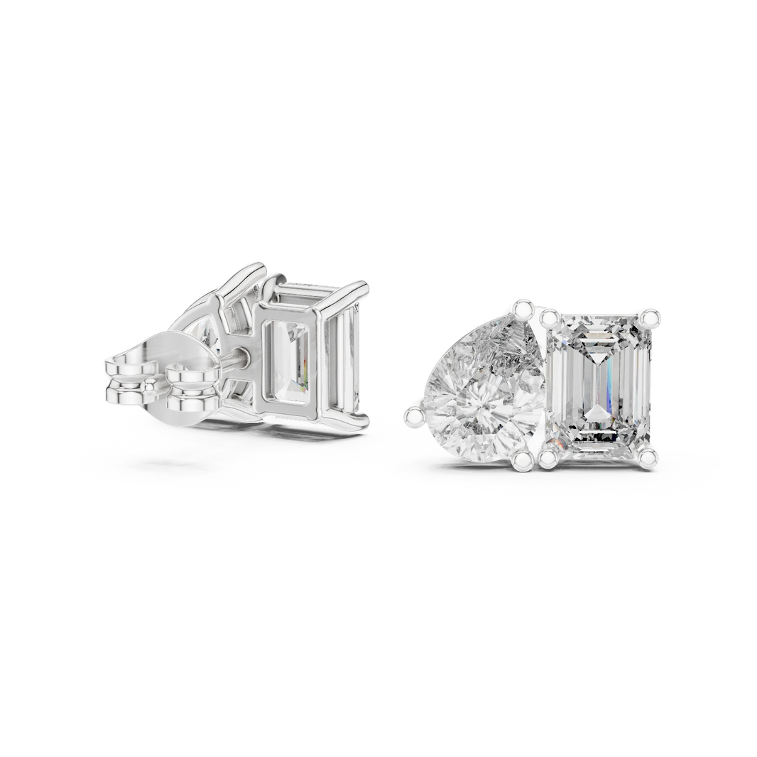 Emerald Cut and Pear Toi et Moi Moissanite Stud Earrings in white 925 sterling silver, view 1